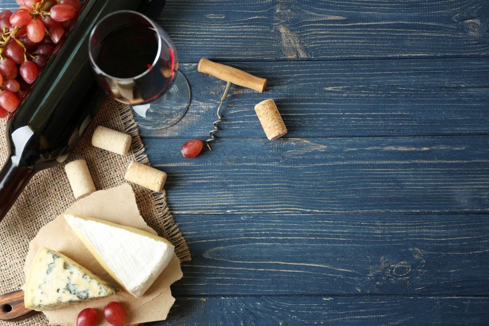 Wine,,Red,Grape,And,Cheese,On,Wooden,Background