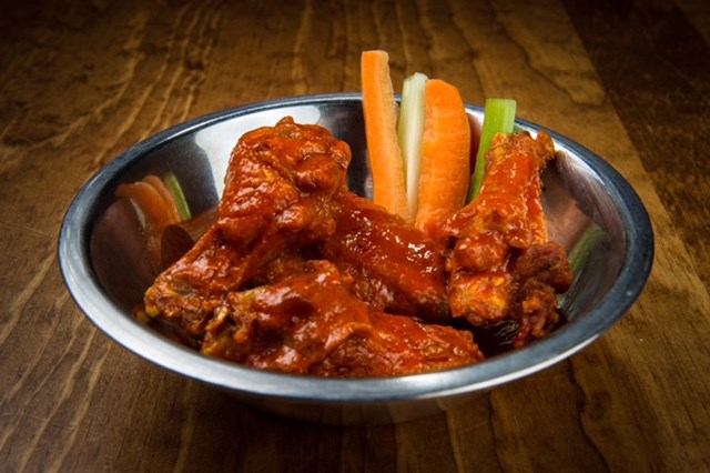 In addition to signature pies, GAPco also offers wings | Image courtesy of Greenville Avenue Pizza Company