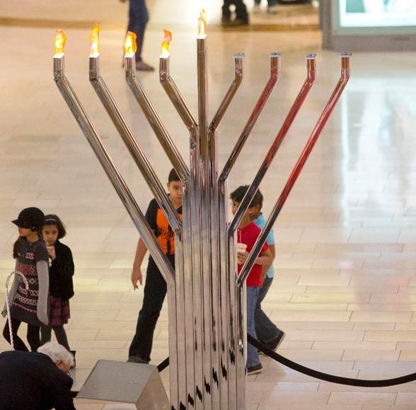 The menorah lighting at the Galleria Dallas is one of the best things to do this weekend in Dallas that honor's another cultural celebration of the holiday season.