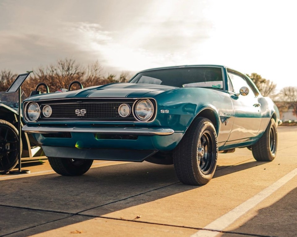 Pictured is a classic car at the auto show. 