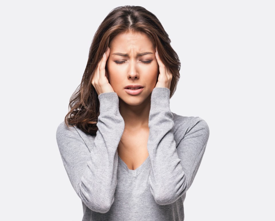 Young,Beautiful,Woman,Has,Headache,,Isolated,On,Gray,Background.,Exhausted