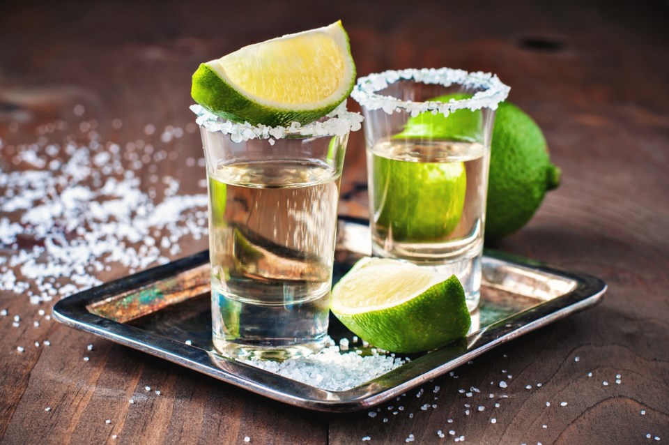Tequila,Gold,,Mexican,,Alcohol,In,Shot,Glasses,,Lime,And,Salt,