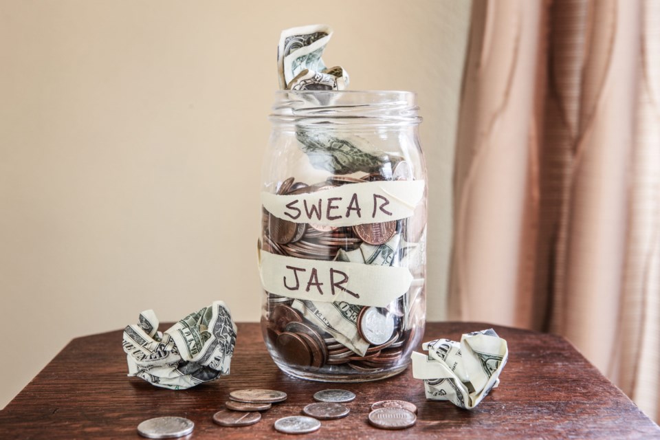 Swear,Jar,To,Prevent,Swearing,,Filled,With,Money