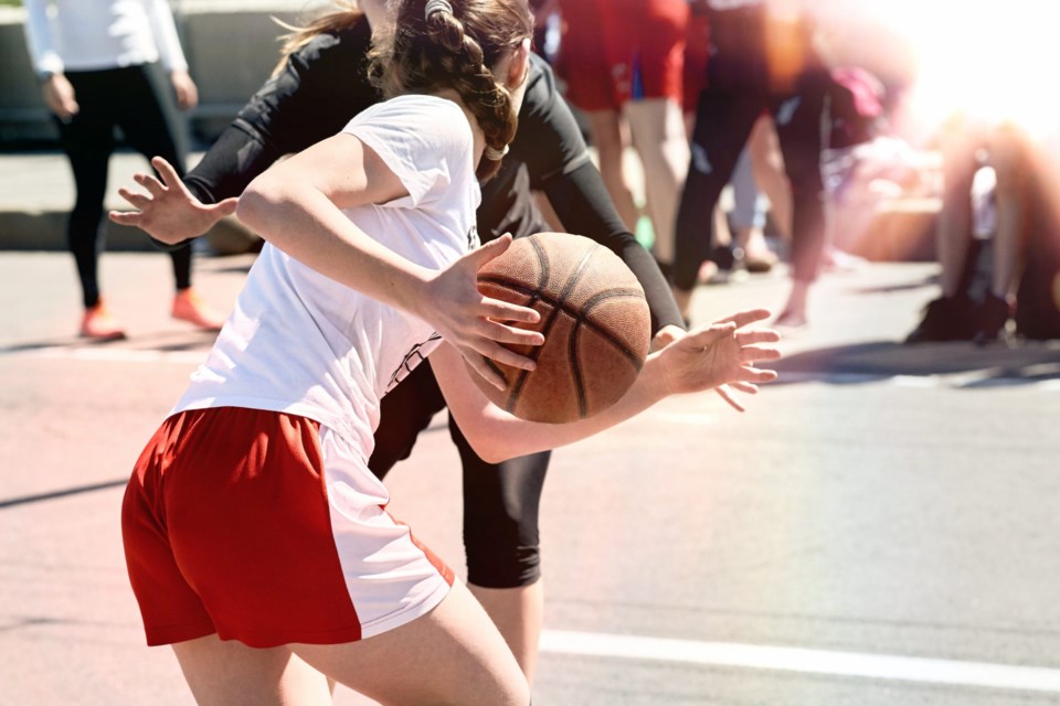 Women,Play,Basketball.,Group,Of,Happy,Teenage,Girls,In,Sports