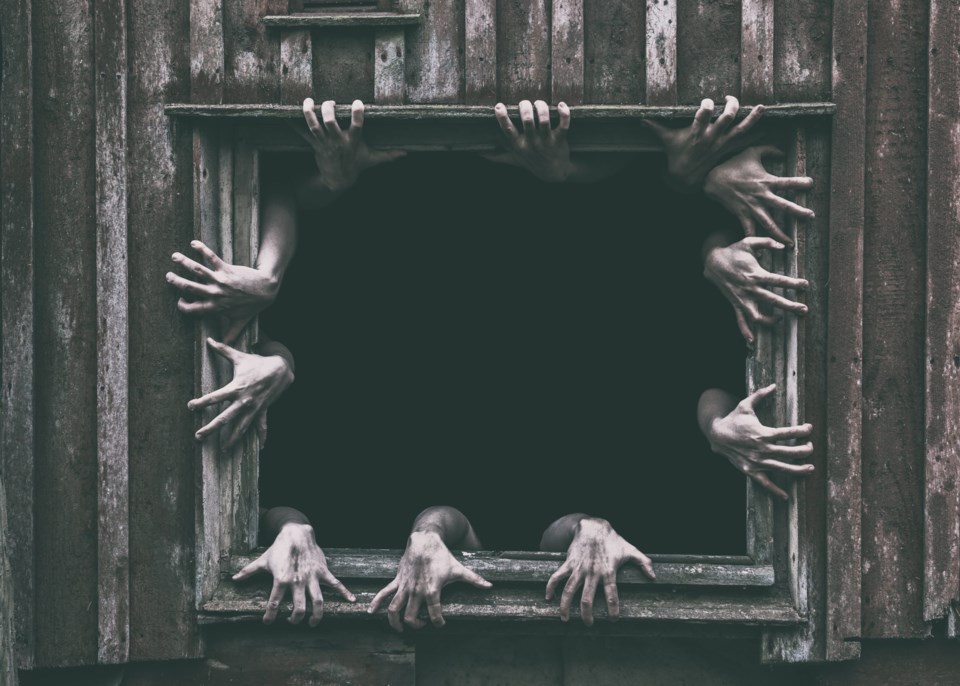 Hands,Rising,Out,From,The,Old,Window,Ancient,House,,Halloween