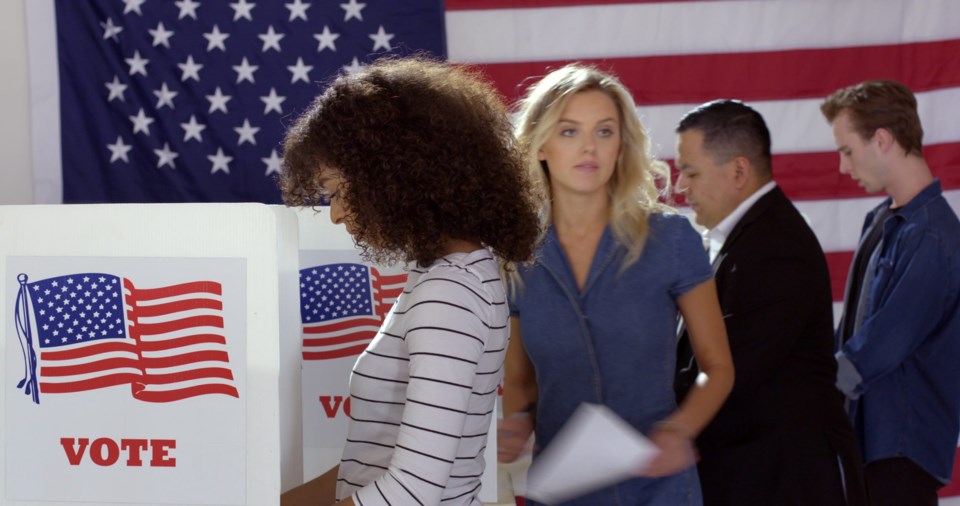 Four,People,Of,Different,Demographics,,Young,Hispanic,Woman,In,Front,