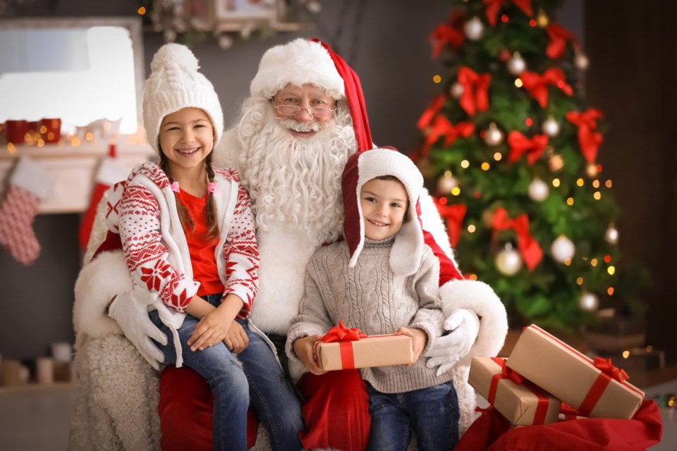 Little,Children,And,Authentic,Santa,Claus,Indoors