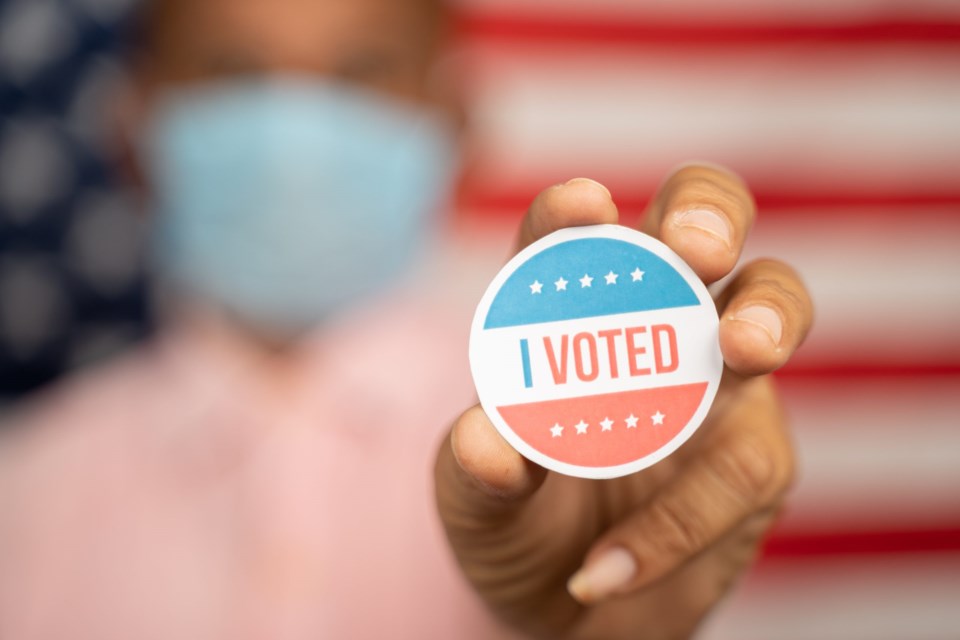 Close,Up,Shot,Man,In,Medical,Mask,Showing,I,Voted