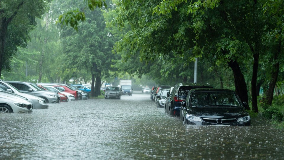 Flooded,Cars,On,The,Street,Of,The,City.,Street,After