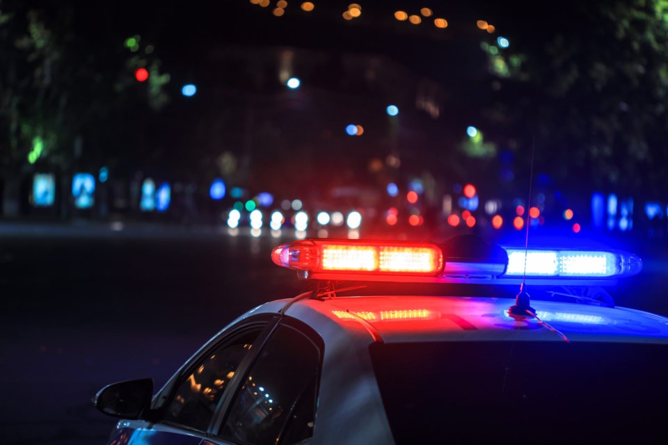 Police,Car,At,Night,In,Street