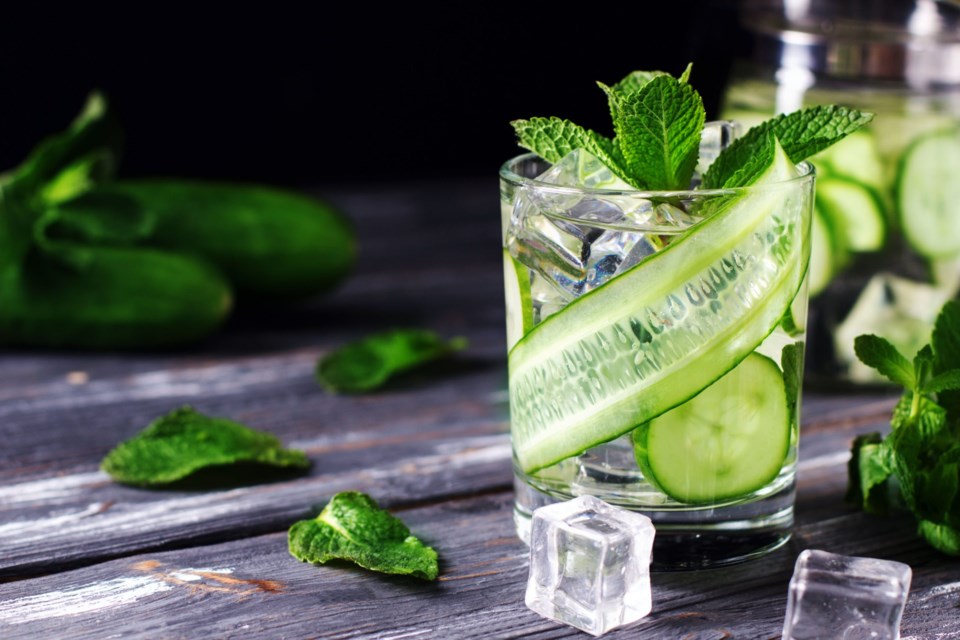 Infused,Cucumber,Drink,With,Mint.,Detox,Water.,Darck,Background.