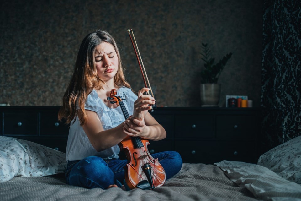 A,Young,Brunette,Girl,Injured,Her,Wrist,While,Playing,The