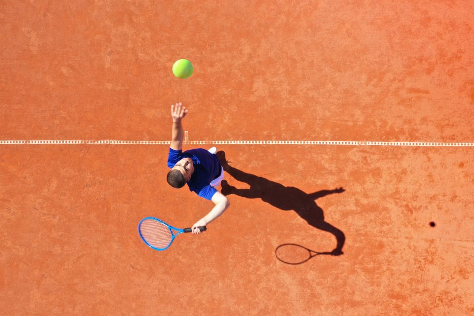 Aerial,View,Of,A,Professional,Tennis,Player,Performing,Powerful,First