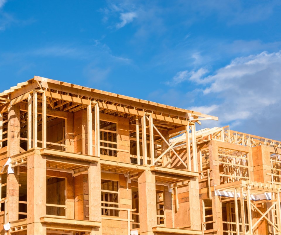 Apartment,Building,Under,Construction,On,Sunny,Day,On,Blue,Sky