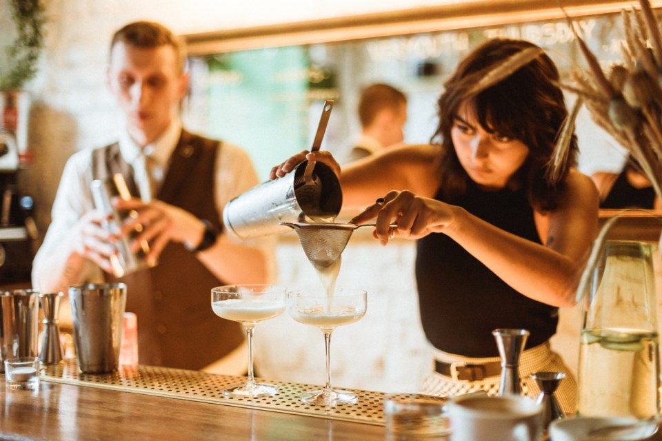 Minsk,,Belarus,,08-02-2018.,Woman,Bartender,Prepairing,A,Cocktail,At,The