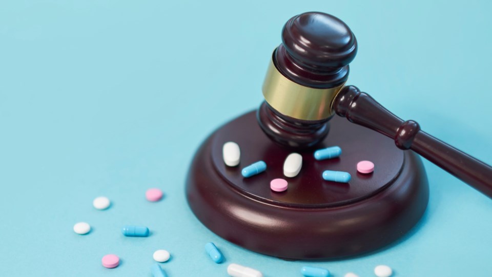 Wooden,Judge,Gavel,With,Drugs,On,Table.,Space,For,Text.