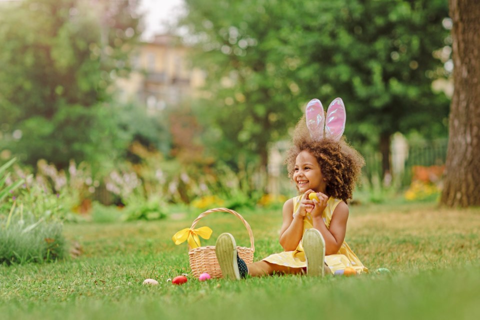 Little,Black,Girl,Wear,Bunny,Ears,And,Gathering,Easter,Eggs