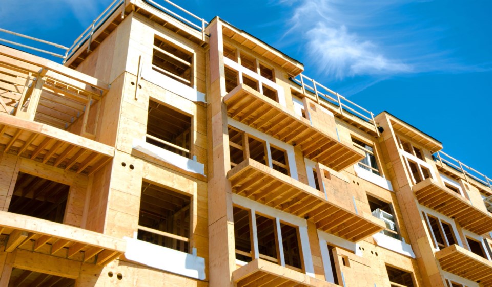 Apartment,Condominium,Complex,,Wood,Frame,Construction,,Victoria,,Canada.,Blue,Sky