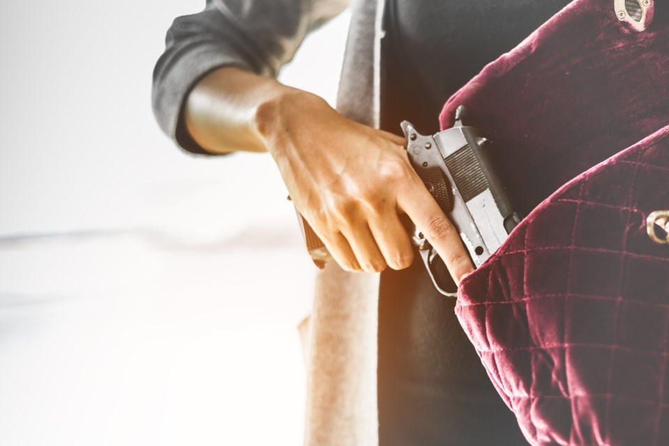 Woman,Pulls,A,Gun,From,Her,Swanky,Purse.,Conceal,Carry