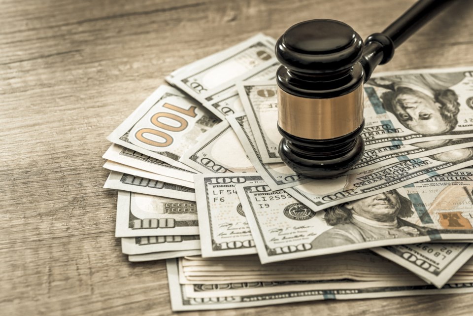 Wooden,Gavel,With,Usa,Dollar,On,Desk.,Close,Up.,Toned