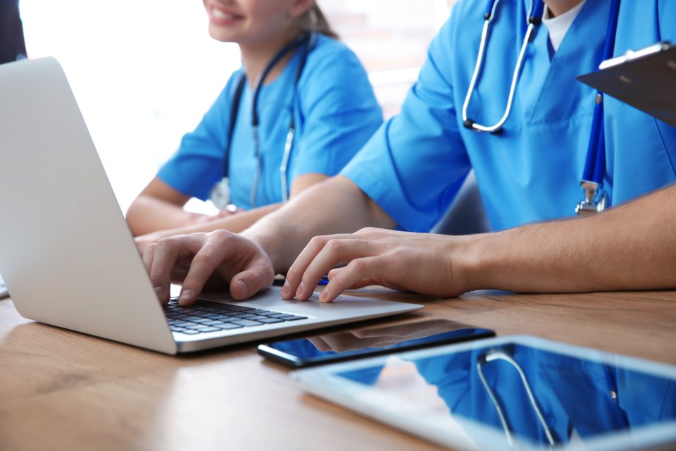 Medical,Students,Studying,At,Table,,Closeup,View