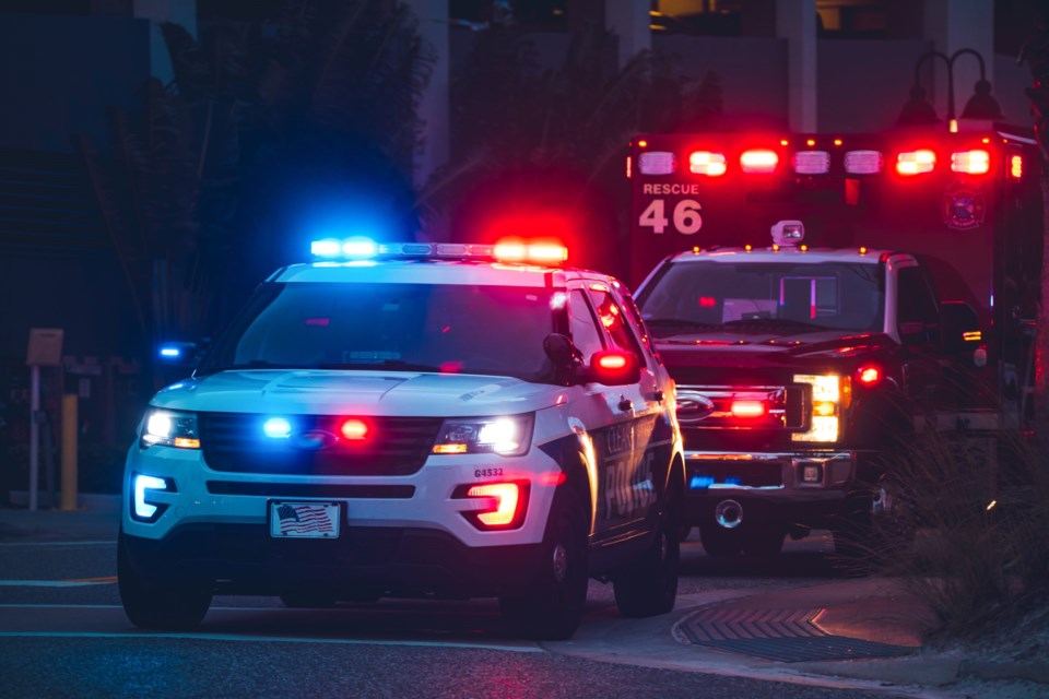 American,Police,Car,And,Emergency,Truck,With,Blue,And,Red