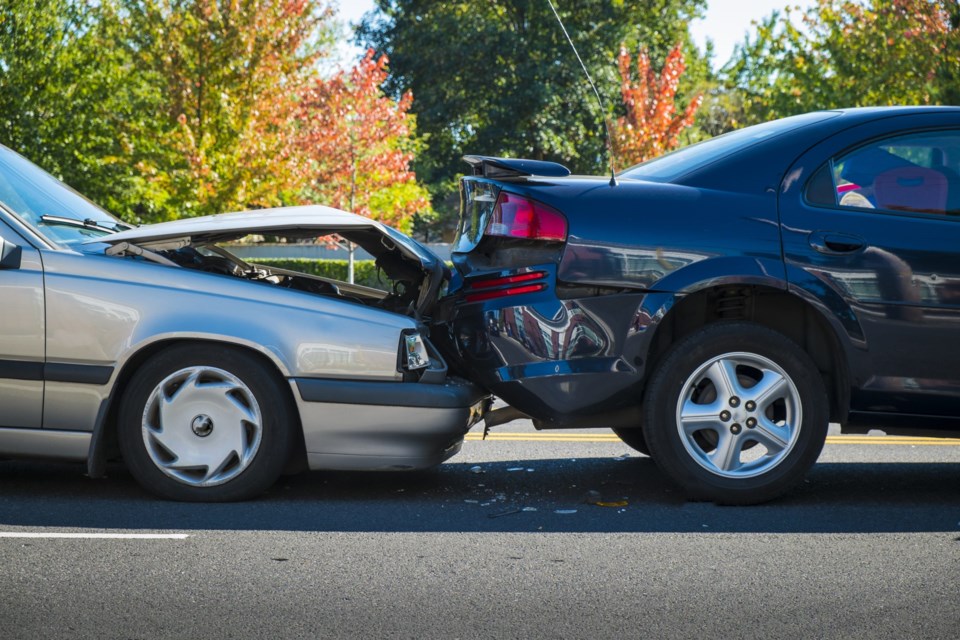 Auto,Accident,Involving,Two,Cars,On,A,City,Street