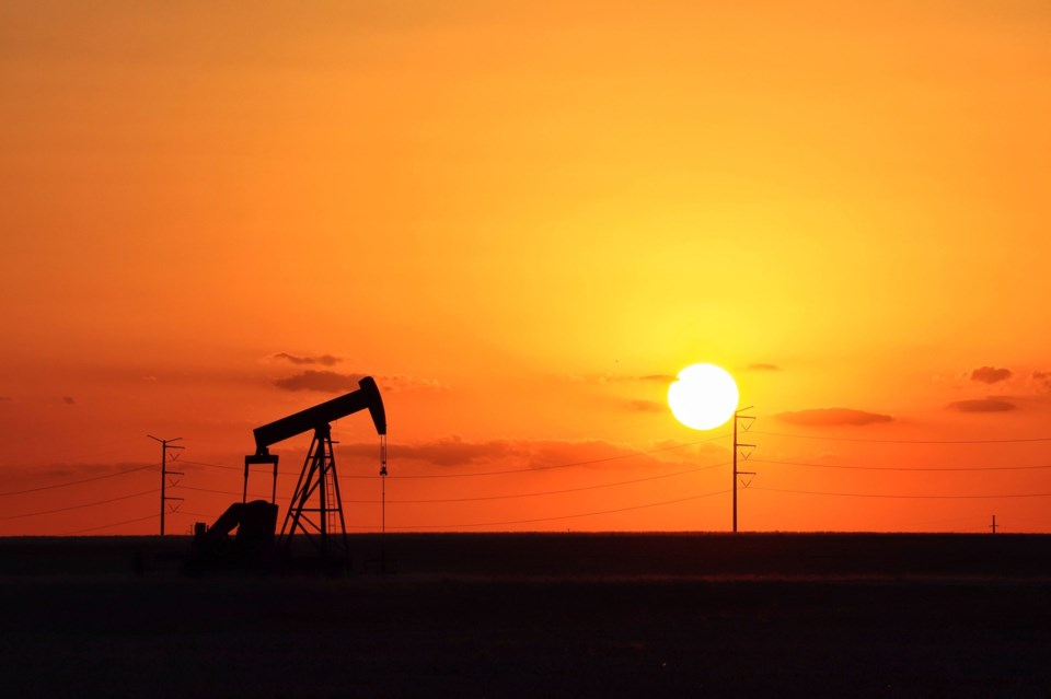 Orange,Sunset,Sky,And,Pump,Jack,Silhouette