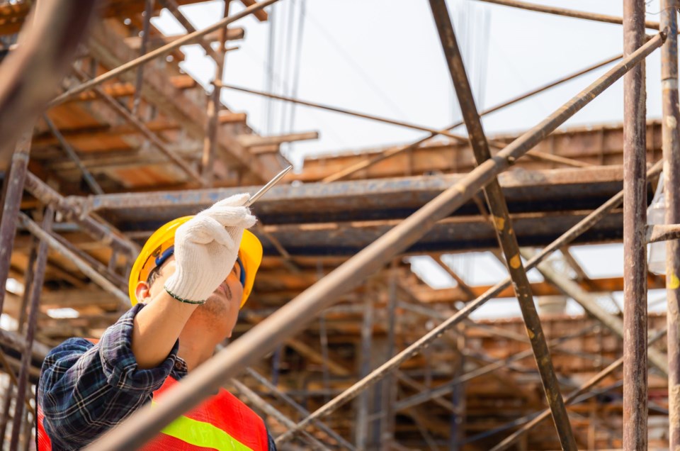 Engineer,Man,Checking,And,Planning,Project,At,Construction,Site,,Man