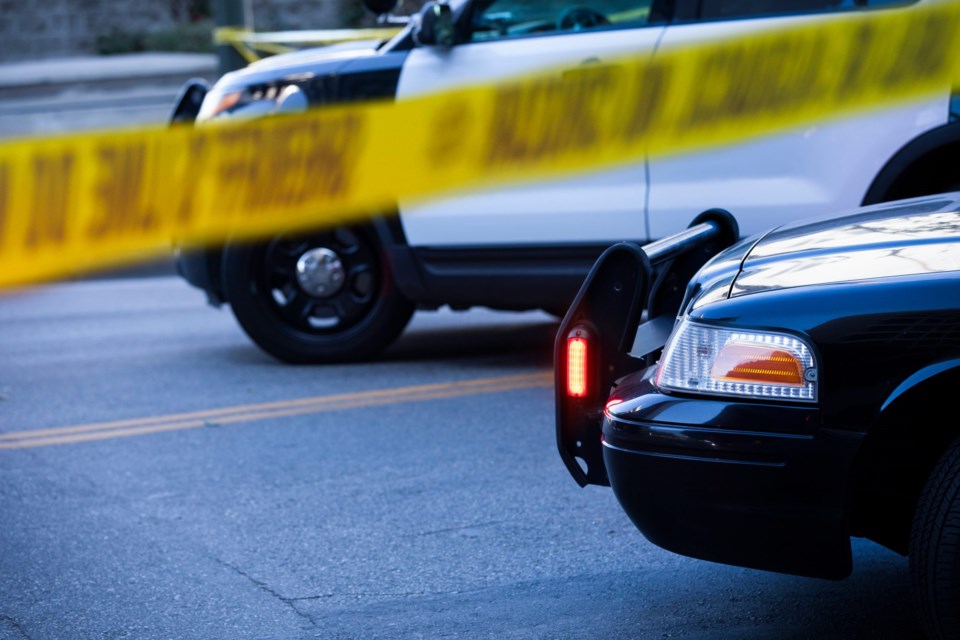 Detail,View,Of,Illuminated,Police,Lights,And,Cordon,Tape.