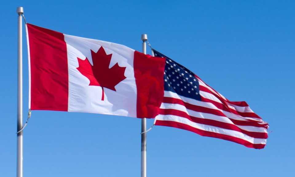 o-CANADA-UNITED-STATES-FLAGS-facebook-1140x684