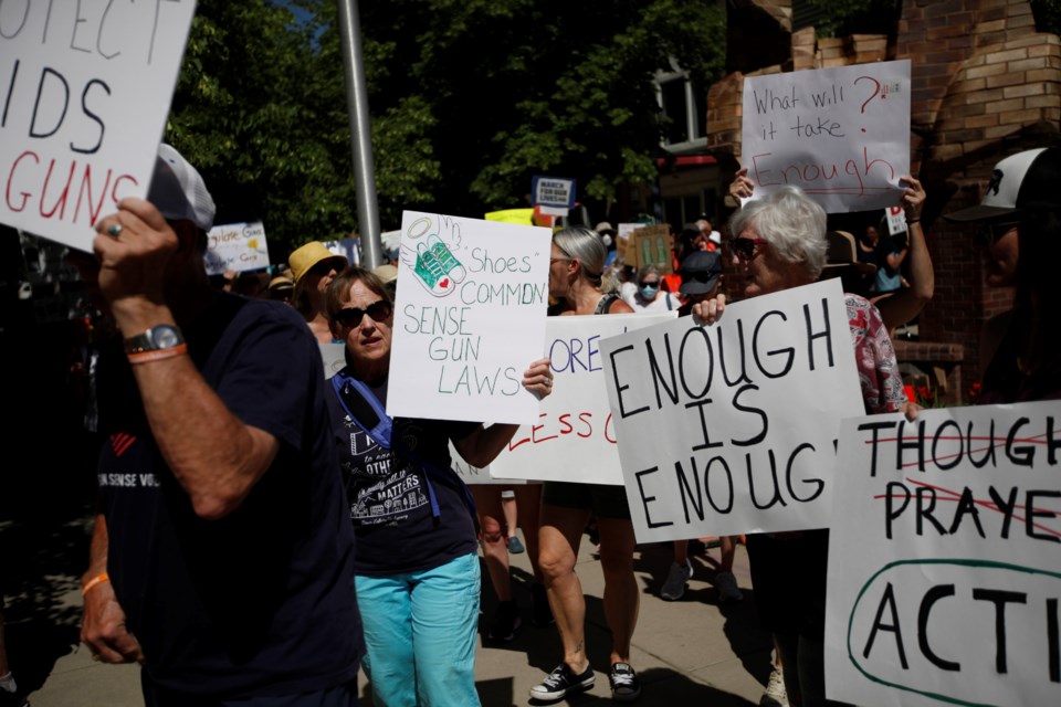 Gun safety protesters marched down Main Street to the Longmont Civic Center as part of Saturday's March for Our Lives protest.