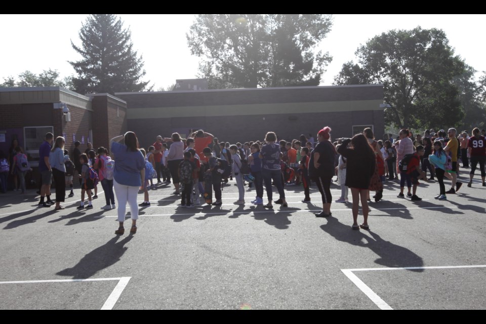 Students line up outside Burlington Elementary School for the 2022-2023 school year on Aug. 17, 2022.