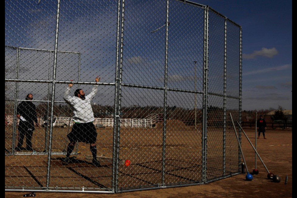 Men and women compete in the Leprechaun Games, a Scottish-Irish Highland Games Charity event, on Saturday at the Boulder County Fairgrounds.