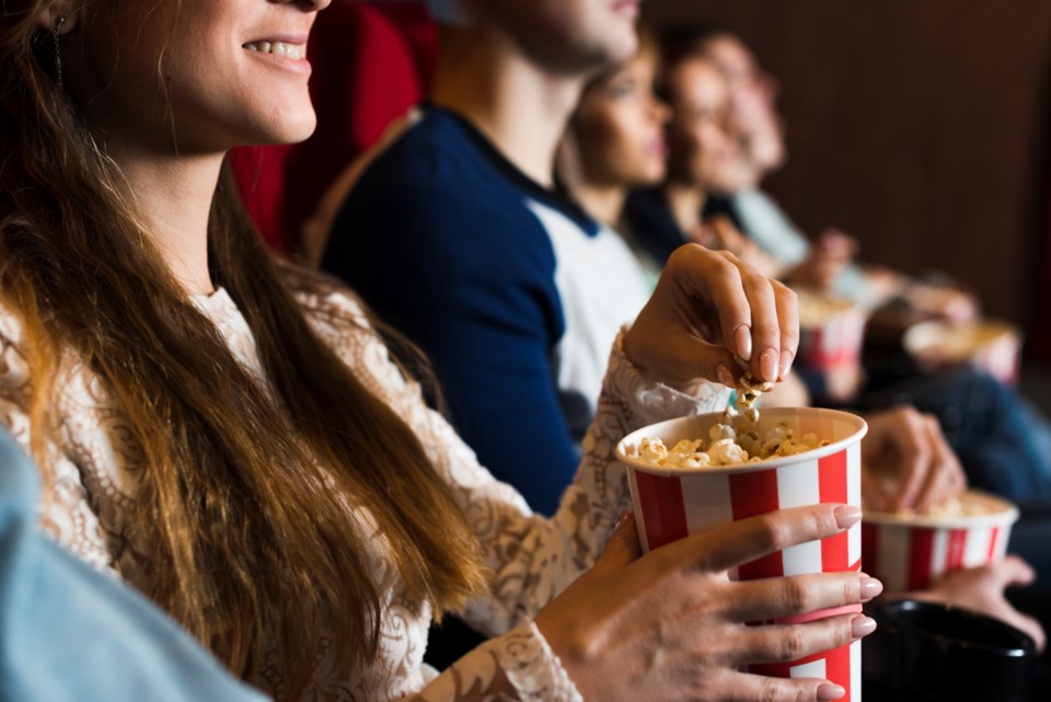 group-young-people-cinema