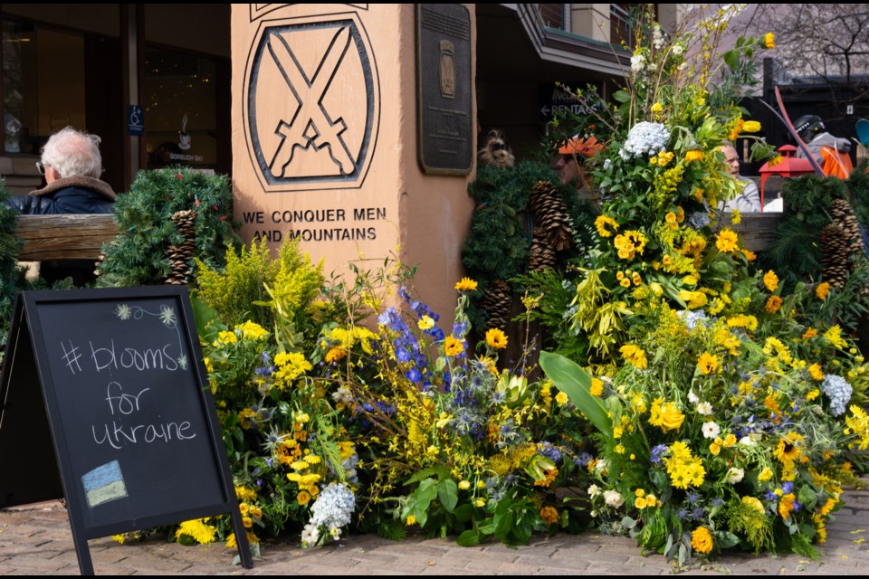 A predominantly yellow floral display -- dotted with plenty of sunflowers, the national flower of Ukraine -- with violet-blue accents spills out into Gondola Plaza in downtown Aspen on Friday. After Ukraine gained independence on Aug. 24, 1991, the blue and yellow flag was established less than a year later, in January of 1992. The yellow symbolizes prosperity and represents the country's vast wheat fields.

Aspen Daily News