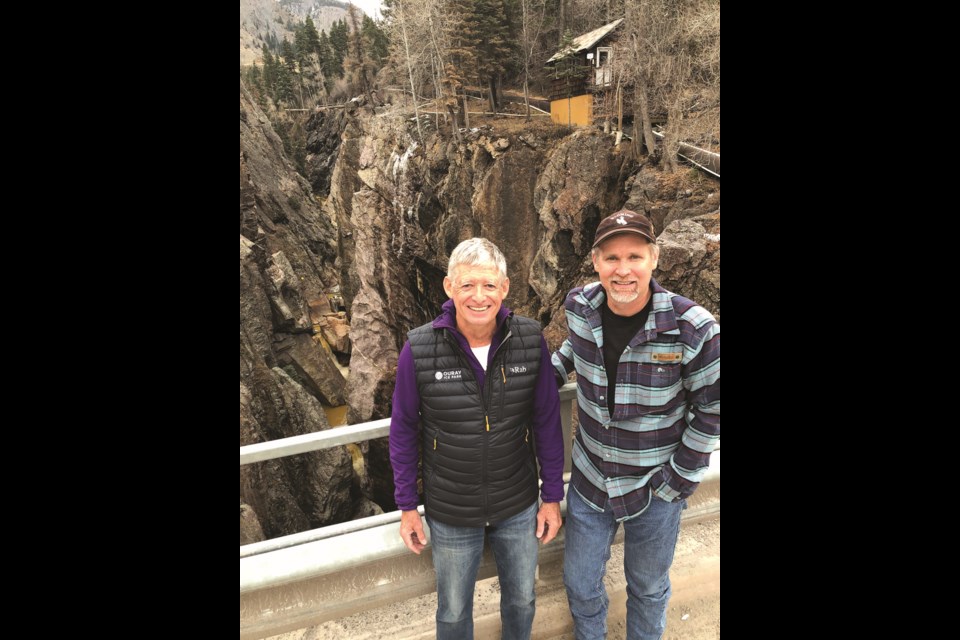 Ouray Ice Park Executive Director Peter O’Neil, left, stands with Ouray Silver Mines CEO Brian Briggs on a bridge overlooking the park in the Uncompahgre Gorge. The two organizations, along with the city of Ouray, have worked out a partnership in which the mine will donate its recreational water right to the city to provide the ice park with a dedicated source of water.

Ouray County Plaindealer