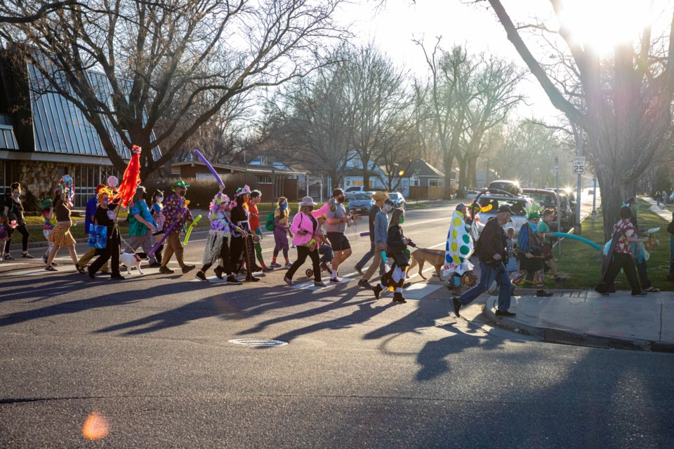 The parade goers nearing the end of the loop, passing Roosevelt Park