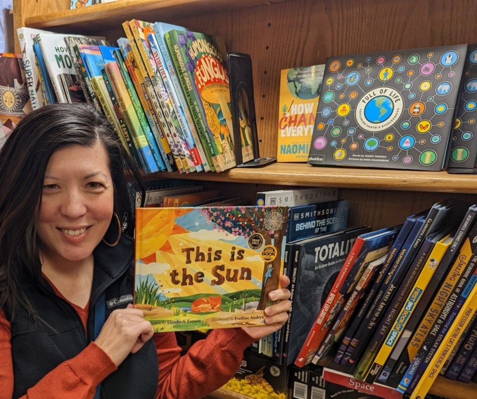 me-holding-book-in-boulder-bookstore