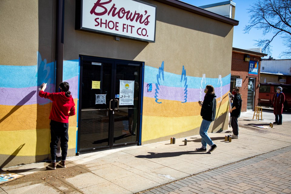 Students Luana, Lucy and Lilia painting while Elaine Waterman observes (1 of 1)