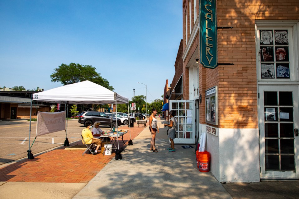 The second weekend of ArtWalk's Summer on the Streets filled the breezeways and alleys off Main Street with artists, vendors and musicians.