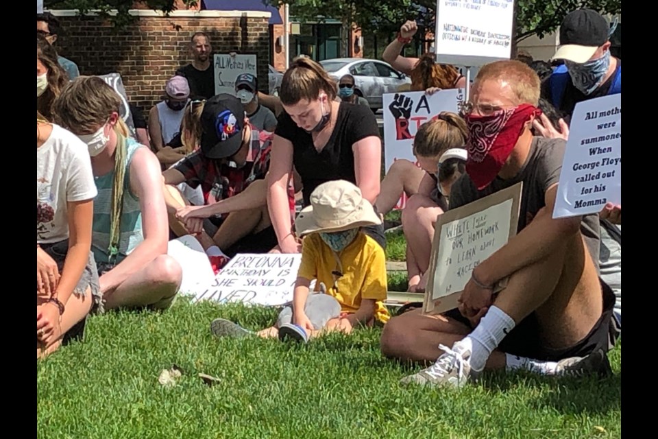 Protesters gather at a June 5 protest in Longmont organized by the Longmont Collective. (Photo by Macie May)