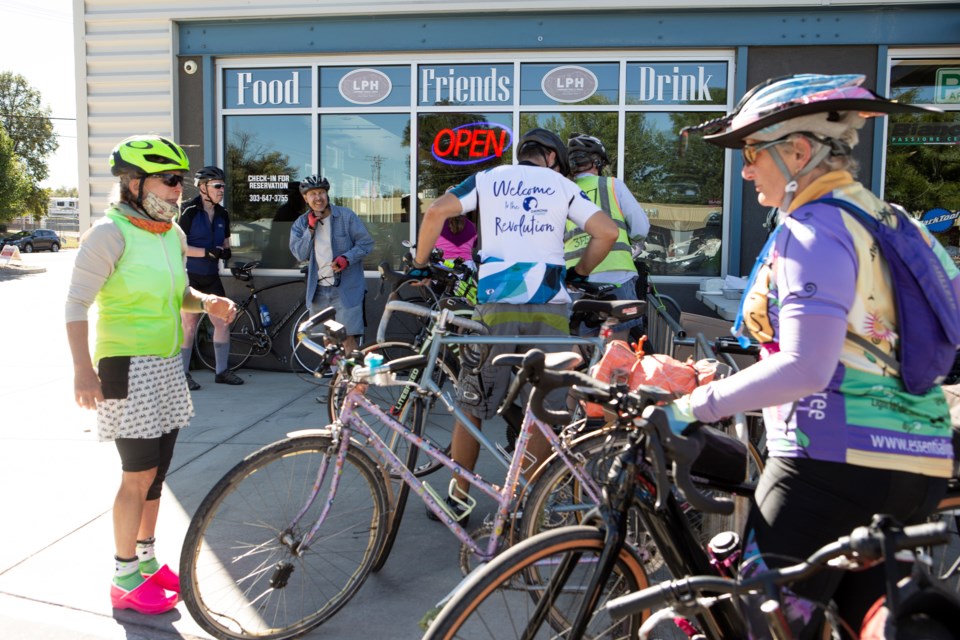 A group of afternoon cyclists arrive at Long Mont Velo's Bike to Work Day party on Sept. 22. Photo by Ali Mai