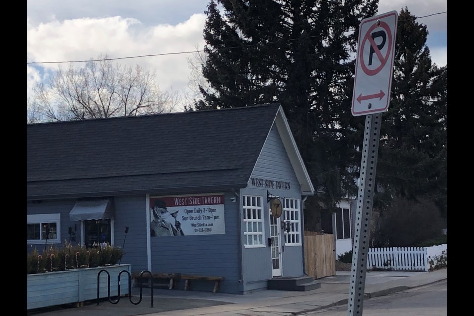 No parking zones extended outside Westside Tavern along Third Avenue due to safety concerns