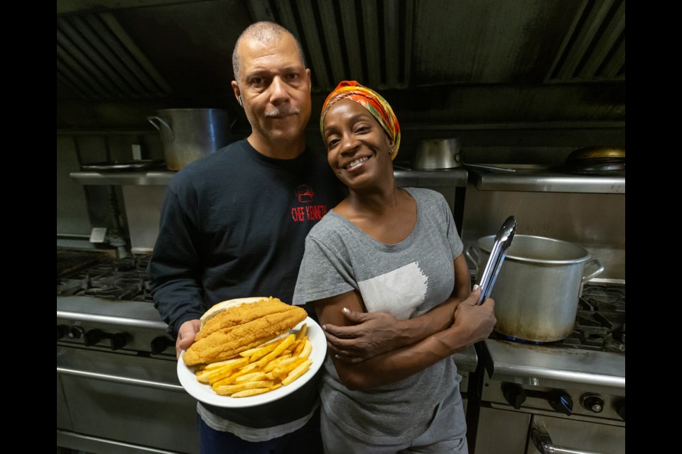 Kenneth and Tondra Gaspard, founders of the New Orleans Chefs of Colorado, with a plate of "Bayou Fried Fish" and Cajun seasoned fries at the Elks Lodge commercial kitchen in Longmont. Photos by Ali Mai 