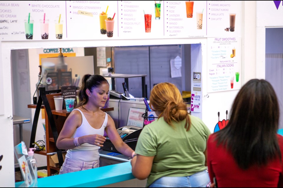 MALDOS Coffee and Boba co-owner Nora Maldonado takes drink orders on Aug. 31 at the boba shop Old Town Marketplace in downtown Longmont. Photo by Ali Mai