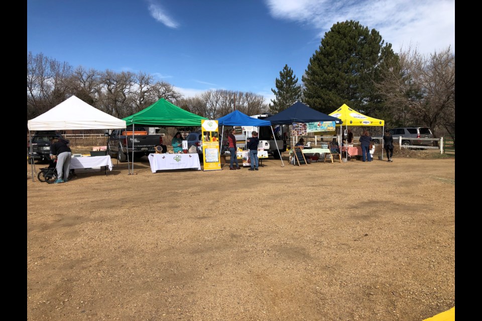 Farmers set up for the first collaborative distribution event at Ollin Farms