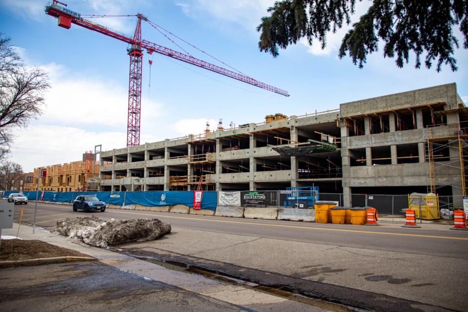 Construction on parking structure and apartments for The Spoke at 518 Coffman