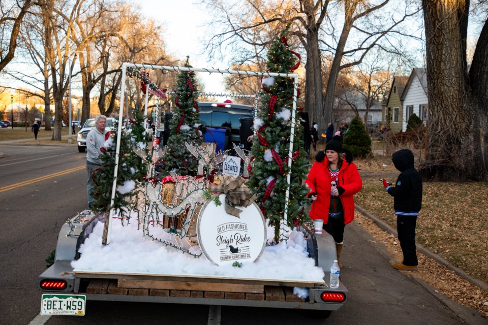 Longmont residents made mirth and merry on Main Street last night The
