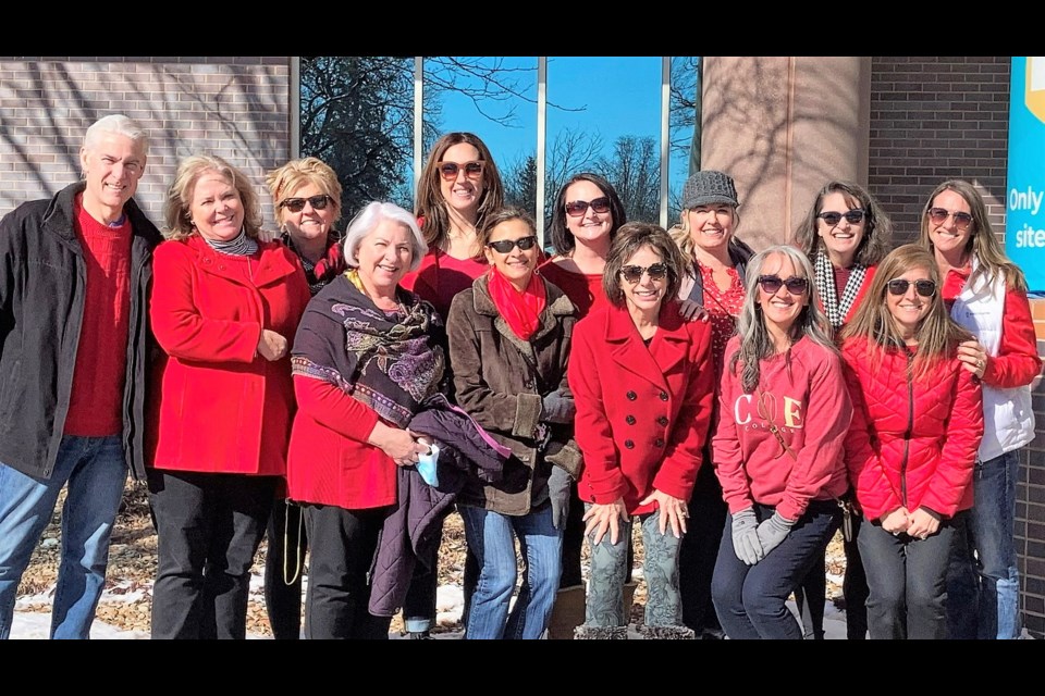 Members of A Woman's Work and the Longmont United Hospital Foundation dressed in red and walked around the hospital to bring awareness to American Heart Month